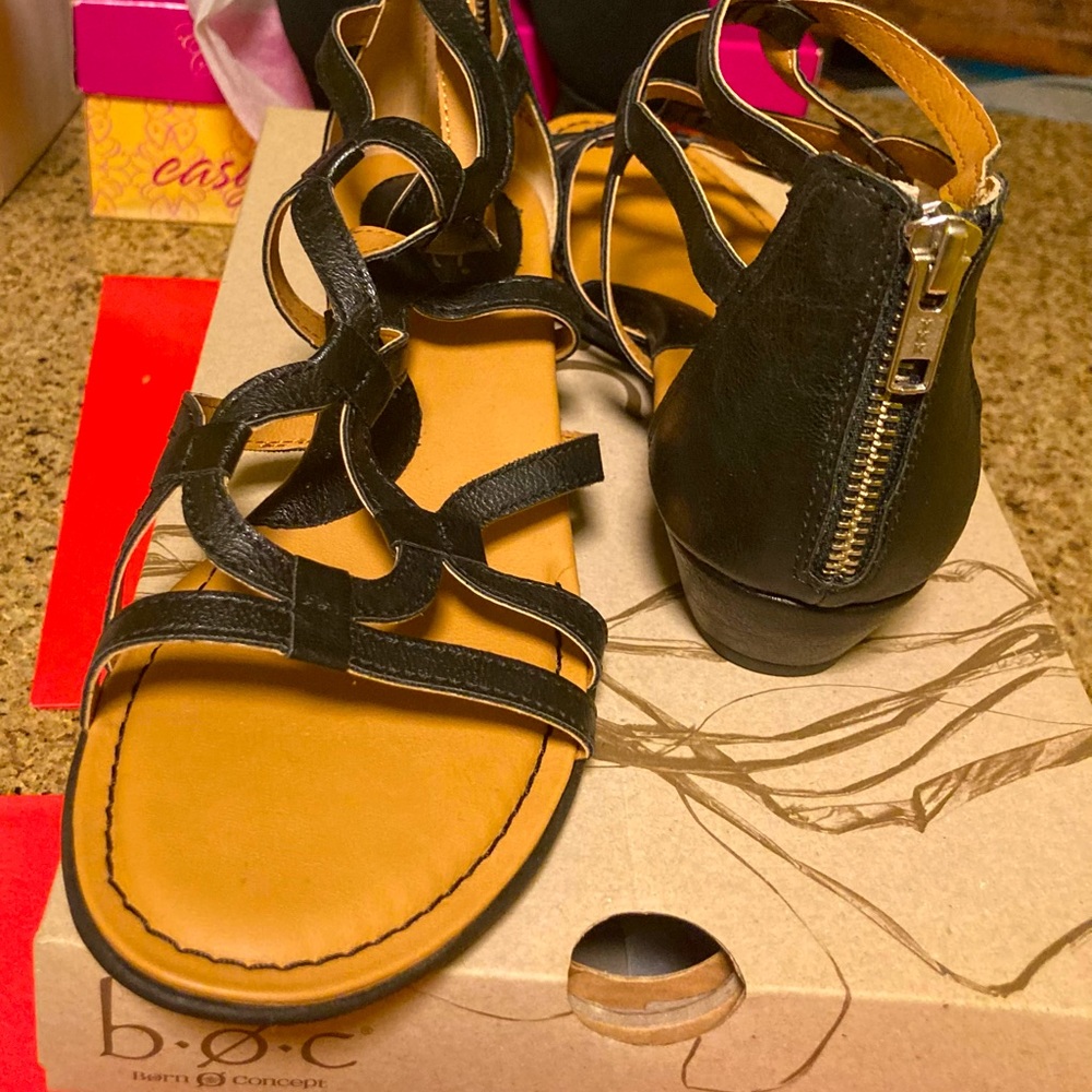 Sandals with a kick! Never worn, in original box